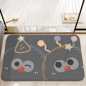 Close-up detail of the cute cartoon bath mat, showing soft surface and fun design.