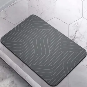 Grey bathroom floor mat with modern wavy geometric pattern, absorbent anti-slip design.
