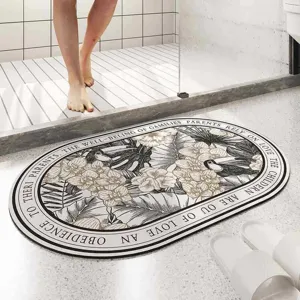 Detailed view of the vintage floral diatomaceous earth bath mat in a modern bathroom.