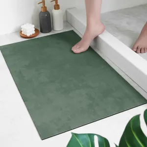 Soft diatomaceous earth bath mat, dark green absorbent floor mat for bathroom and shower room use.