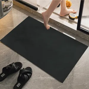 Modern black absorbent bathroom floor mat quick drying non slip shower door mat for home.