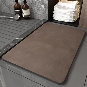 Detail view of modern minimalist brown bath mat in luxury bathroom scene with clean styling.