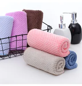 Thickened coral fleece face towels with pineapple grid design, soft and super absorbent.