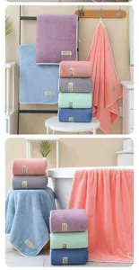 Solid color soft coral fleece bath towel, highly absorbent and comfortable home use.