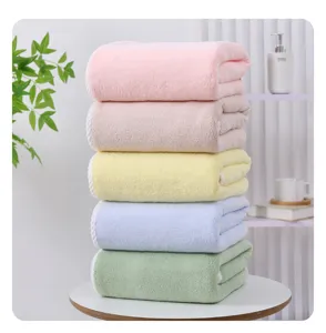 Soft coral velvet bath towel set, solid color absorbent shower towel for home use, gentle and cozy.