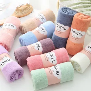 High density coral fleece towel rolled with paper belt, soft absorbent and colorful.