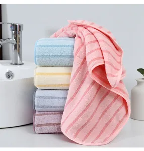 Soft striped face towel coral fleece absorbent daily bathroom towel for students and adults.