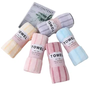 5-pack rolled striped coral fleece face towels with paper belly bands, soft absorbent.