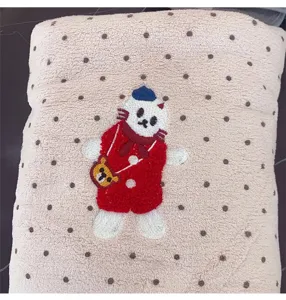 Coral fleece towel detail, cute cat embroidery pattern, soft and absorbent fabric texture