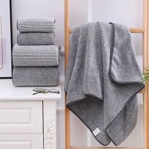 Thickened coral fleece towel set, soft absorbent face and bath towels for home use.