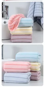 Soft coral fleece face towels featuring vertical stripes, highly absorbent for daily use.