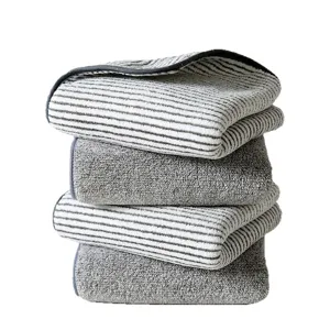 Thickened bamboo charcoal fiber and coral fleece towel set, soft striped and solid grey face towels.