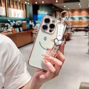 Coque iPhone galvanisée avec motif de visage souriant mignon et bracelet élégant de luxe.