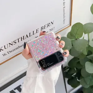 Detailansicht der klaren Glitzer Schutzhülle mit pinken Pailletten für faltbare Handys.