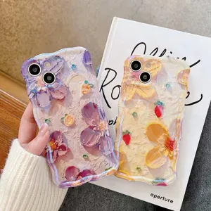 Detail view of wavy silicone phone case featuring 3D oil painting floral and fruit designs.