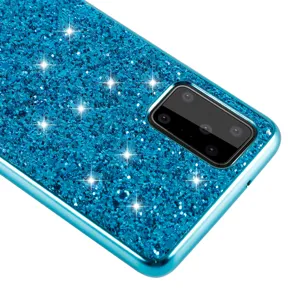 Blue glitter phone case detail showing sparkling surface texture and precise camera cutout hole.