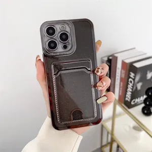 Detailed view of electroplated glitter phone case with card holder slot for iPhone.