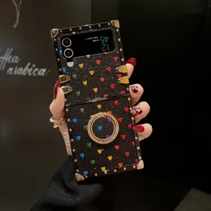Glitzer Herz Klapp Handyhülle mit integriertem Ringhalter und Metallecken für Samsung Z Flip.