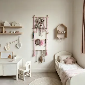 Hanging wall organizer details showing pink tassels and wooden bars for cute room decor storage.