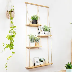 Wooden hanging wall shelf with multi tiers and jute rope, ideal for plant and home decor.