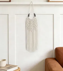 Bohemian macrame wall hanging with horseshoe design, perfect boho home decor and gift.