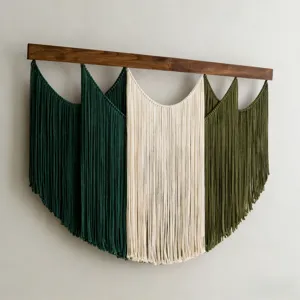 Handmade macrame wall hanging detail with wooden rod, multi-color fringe boho home decor.