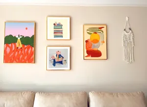 Bohemian wall art set with framed canvas prints and woven tapestry for modern home decor.