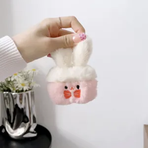 Cute plush earphone protective case detail view, soft furry rabbit design with sweet bow knot.