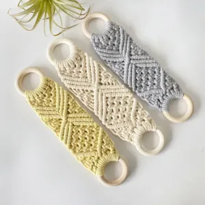 Handcrafted macrame towel holder boho wall hanging organizer with wooden rings for home decor