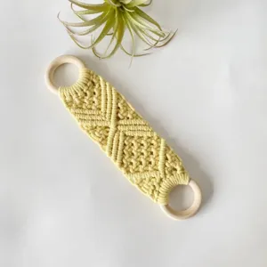 Nordic style handmade woven macrame towel and scarf holder with wooden rings for home decor