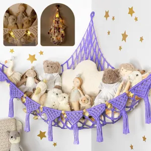 Handmade macrame toy hammock for corner, bohemian plush toy storage net with tassels.