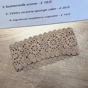 Handmade crochet knit headband, retro hollow floral design, soft hair wrap accessory for women.