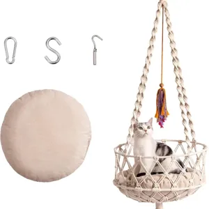 Handmade macrame cat hammock bed with soft cushion and hanging hardware for indoor use.