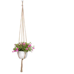 Bohemien handgemaakte plantenhanger detail, jute touw houder voor interieur decor.
