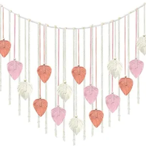 Handmade macrame leaf wall hanging with wooden beads, bohemian decor detail display view.