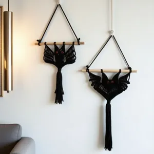 Handmade macrame bat wall hanging detail, gothic Halloween room decor, black woven tapestry