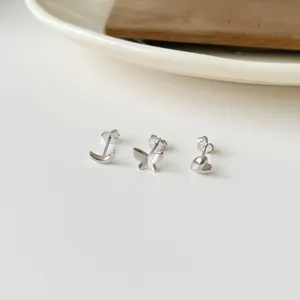 Cute silver earrings set featuring moon butterfly and heart minimalist designs for daily wear.