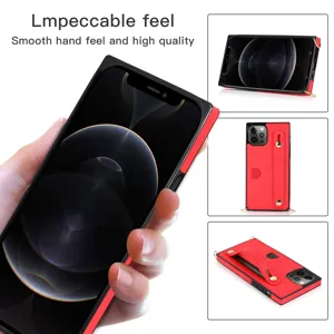Rood lederen telefoonhoesje detail met kaartsleuf, handriem en handig draagkoord.