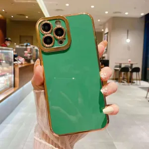 Luxury electroplated green phone case with golden edge camera protector for iPhone.
