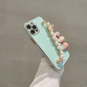 Solid color electroplated phone case with elegant pearl bracelet strap for stylish protection