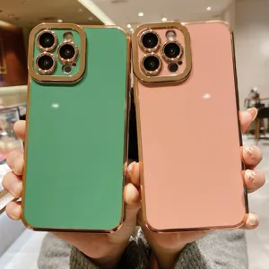 Detail view of electroplated soft phone case with camera lens protection, green and pink colors.