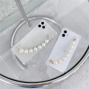 Transparent soft phone case for iPhone with elegant pearl wrist chain strap accessory