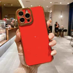 Red electroplated phone case with camera lens protector for iPhone, stylish glossy finish.