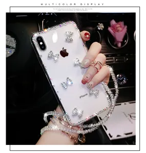 Elegante custodia trasparente per cellulare con fiocco in strass e laccio per iPhone
