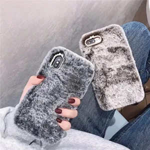 Fluffy plush phone case with sparkling rhinestone camera frame, soft winter warm protective back cover.