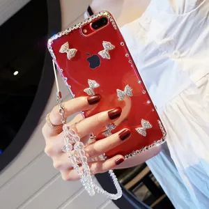 Clear rhinestone bow phone case with beaded wrist lanyard luxury bling TPU cover for iPhone.