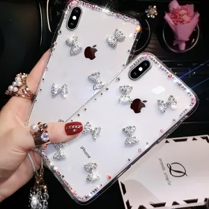 Cover iPhone trasparente con fiocco in strass, custodia protettiva in silicone lucido per donne.