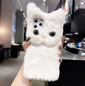 Fluffy white cat plush phone case detail view, soft faux fur texture with cute big eyes.