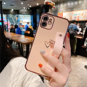 Plated heart phone case with wrist strap for iphone, elegant protective cover accessory.