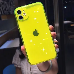 Close-up detail shot of the neon yellow glitter TPU phone case featuring precision camera holes.